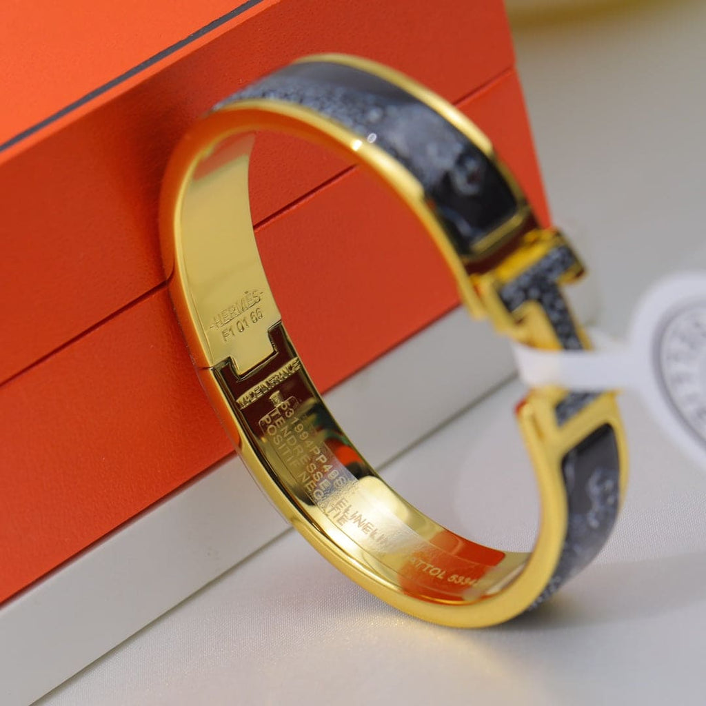 18K Guepards Clic Clac Hermes Bracelet