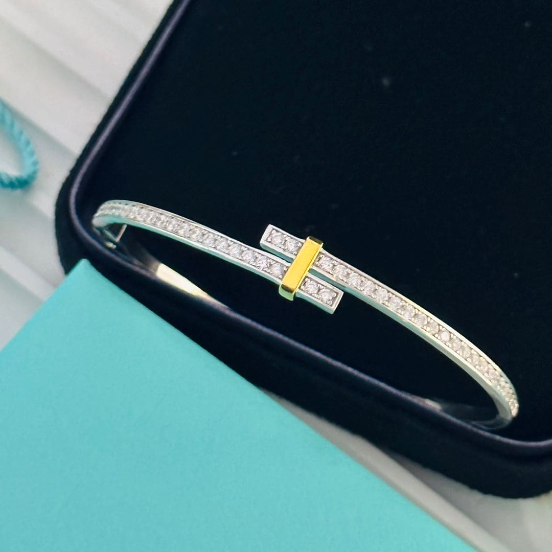 18K Tiffany Edge Hinged Bypass Bangle Bracelet