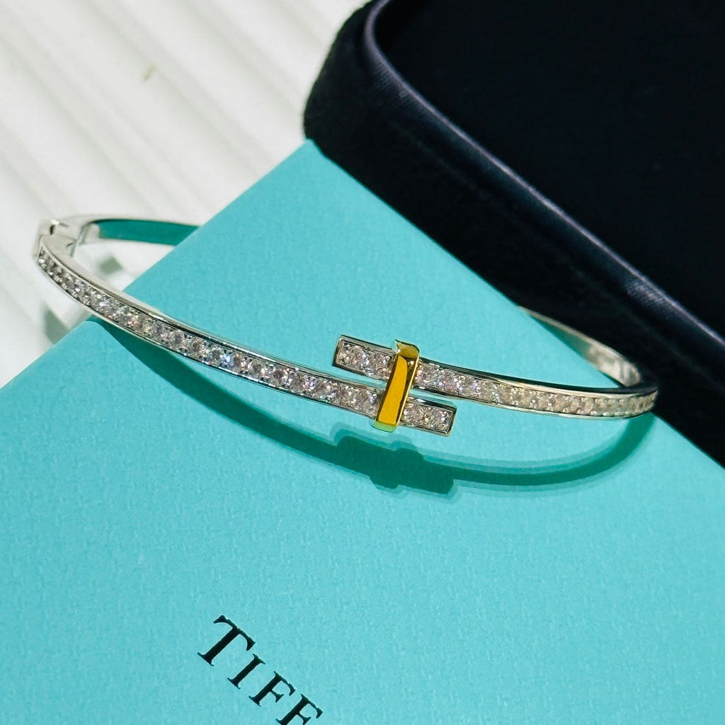 18K Tiffany Edge Hinged Bypass Bangle Bracelet