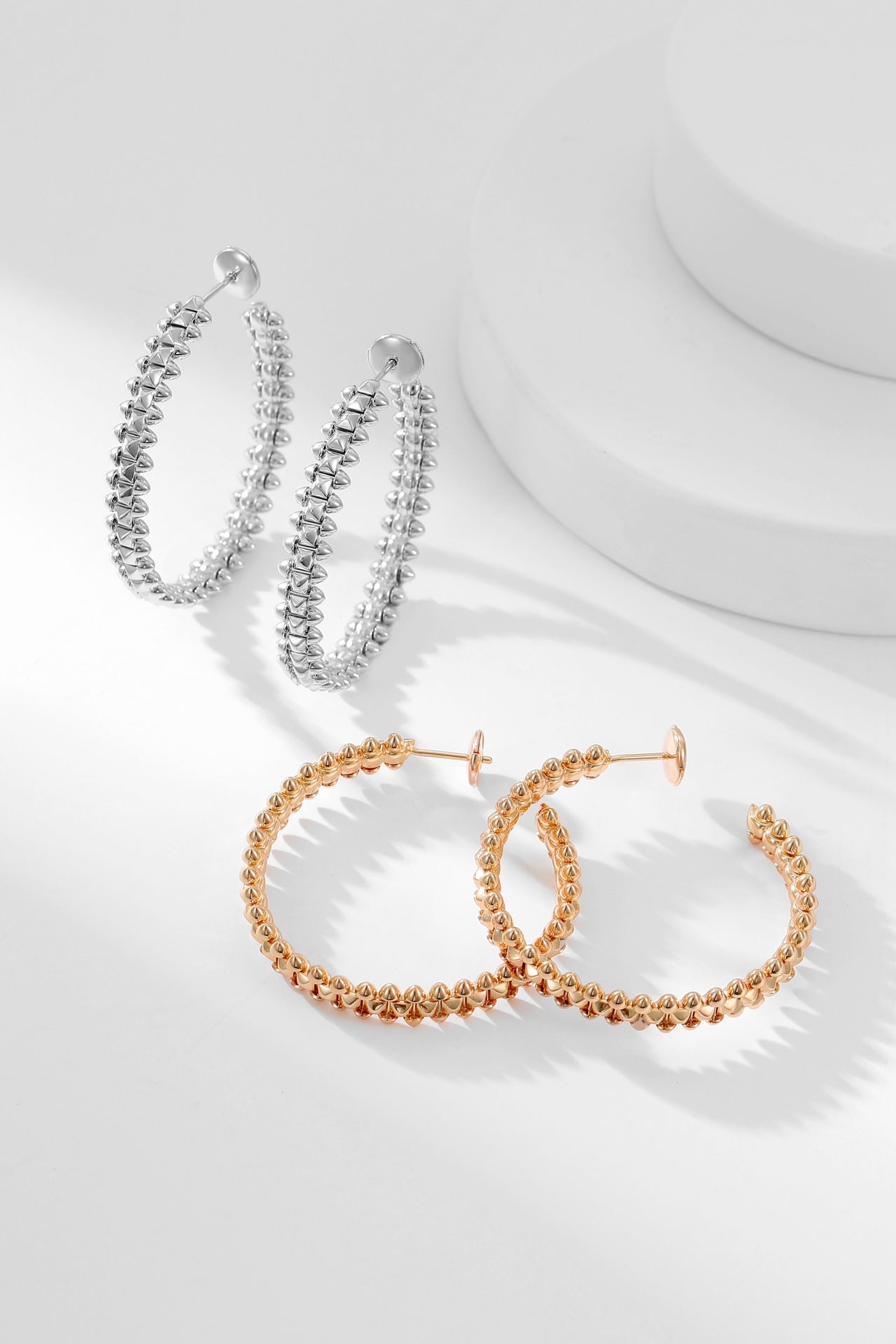 CARTIER CLASH HOOP EARRINGS