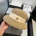 CELINE SMALL BRIM HAT MODEL 650348 IN BEIGE WOVEN STRAW