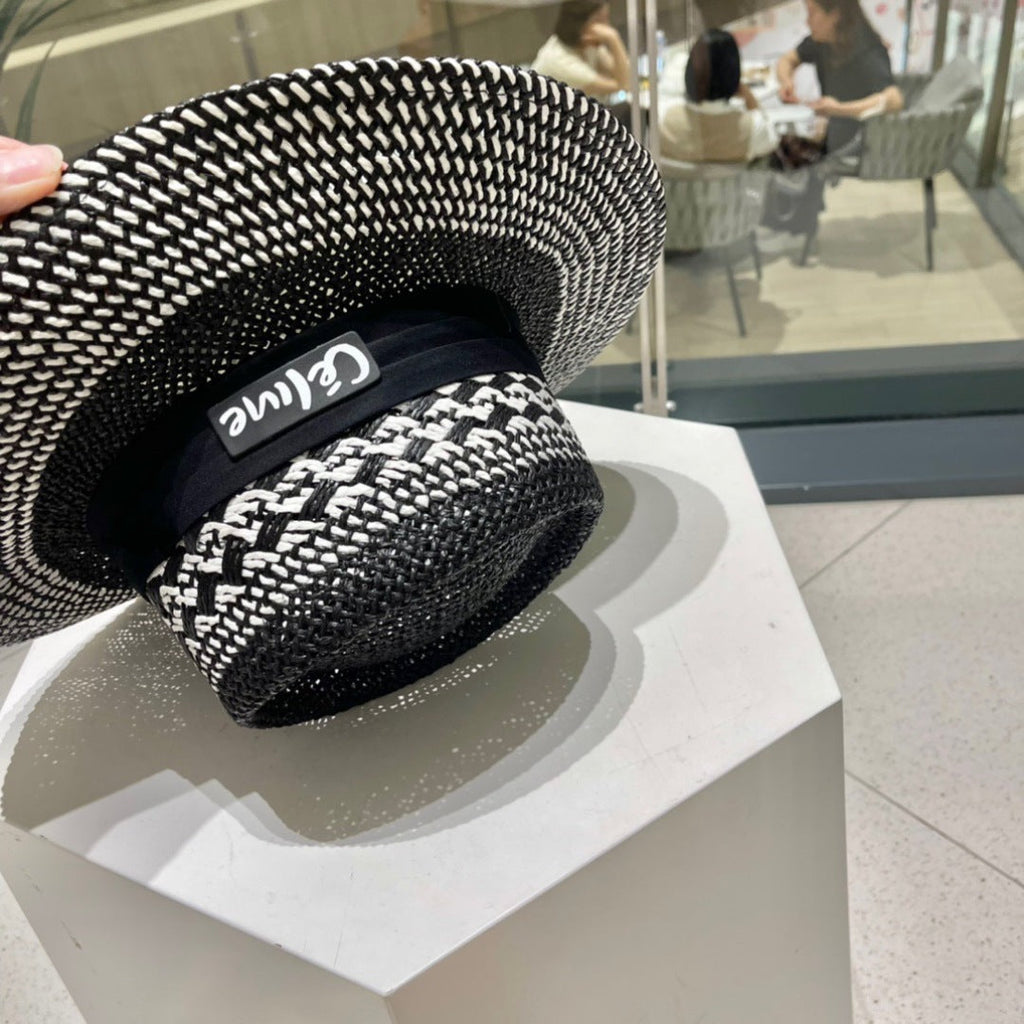 CELINE WIDE BRIM HAT MODEL 652048 IN BLACK AND WHITE WOVEN STRAW