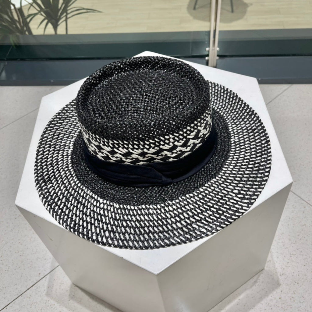 CELINE WIDE BRIM HAT MODEL 652048 IN BLACK AND WHITE WOVEN STRAW