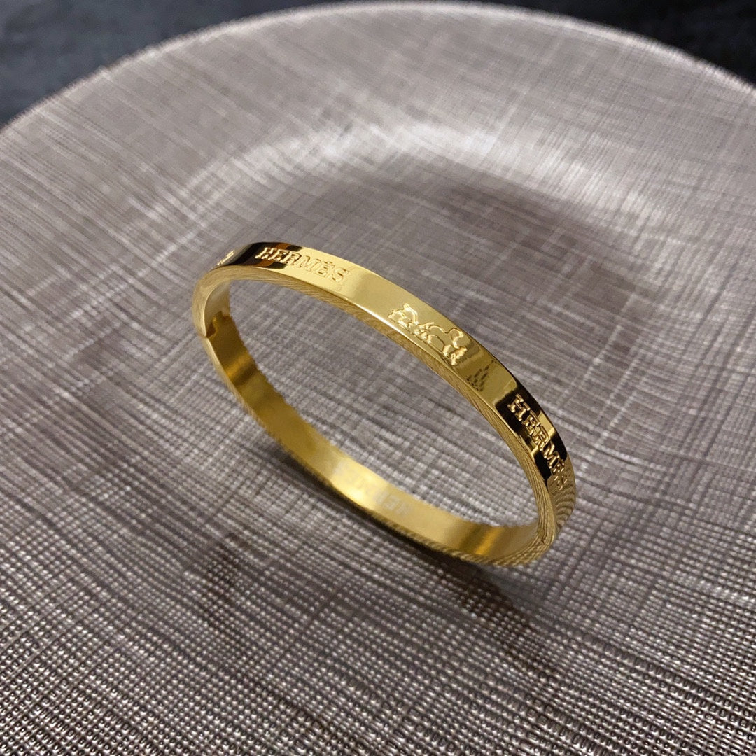 18K Hermes Bracelet