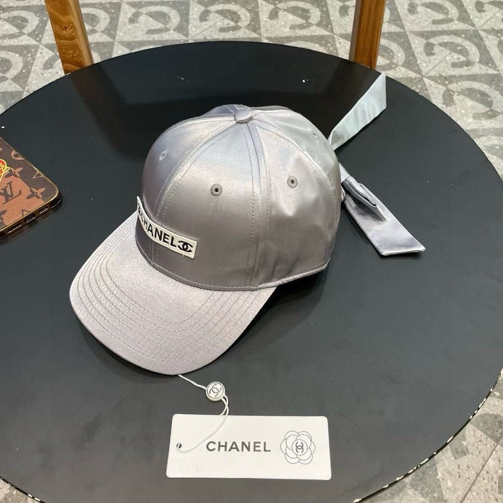 CHANEL BASEBALL HAT IN SILVER SILK SATIN 404865