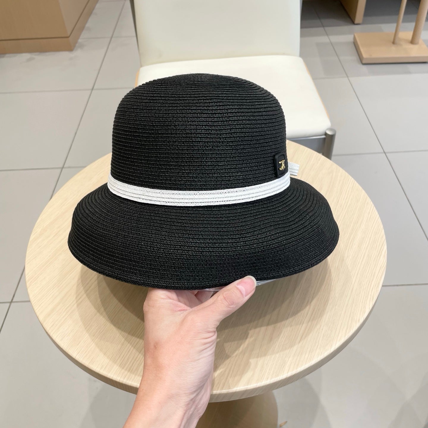 CELINE BUKET HAT MODEL 650561 IN BLACK SPRAY FABRIC
