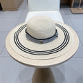 CELINE WIDE BRIM HAT MODEL 650408 IN CREAM WHITE BLACK STRIPES WOVEN STRAW