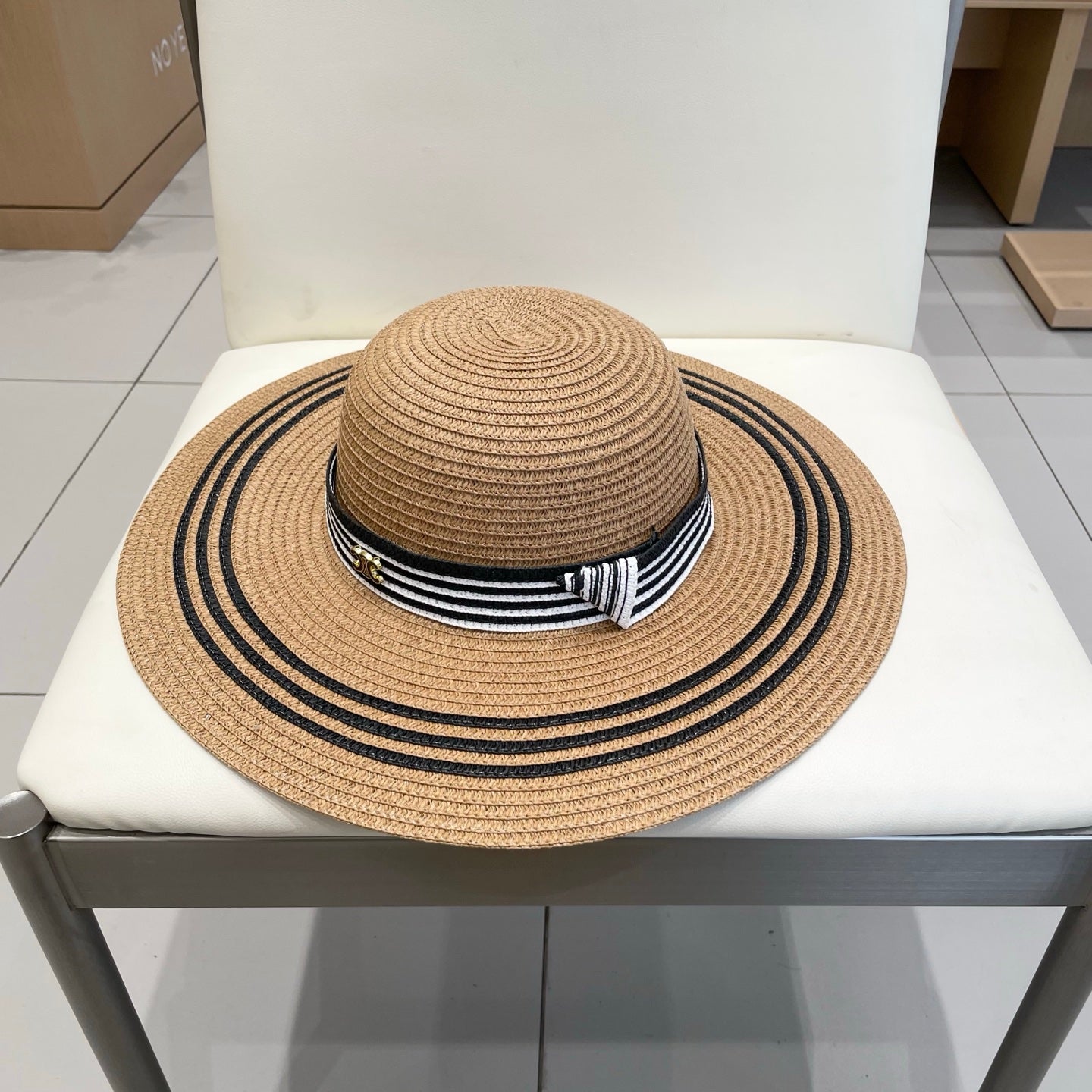 CELINE WIDE BRIM HAT MODEL 650410 IN BROWN WITH BLACK STRIPES WOVEN STRAW
