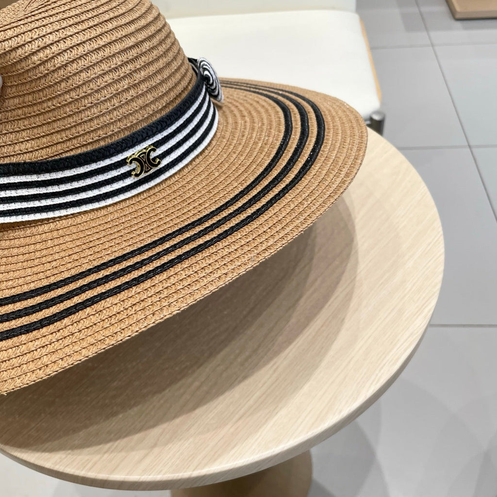 CELINE WIDE BRIM HAT MODEL 650410 IN BROWN WITH BLACK STRIPES WOVEN STRAW