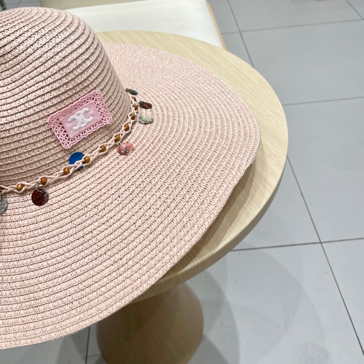 CELINE WIDE BRIM HAT MODEL 652184 IN LIGHT PINK WOVEN STRAW
