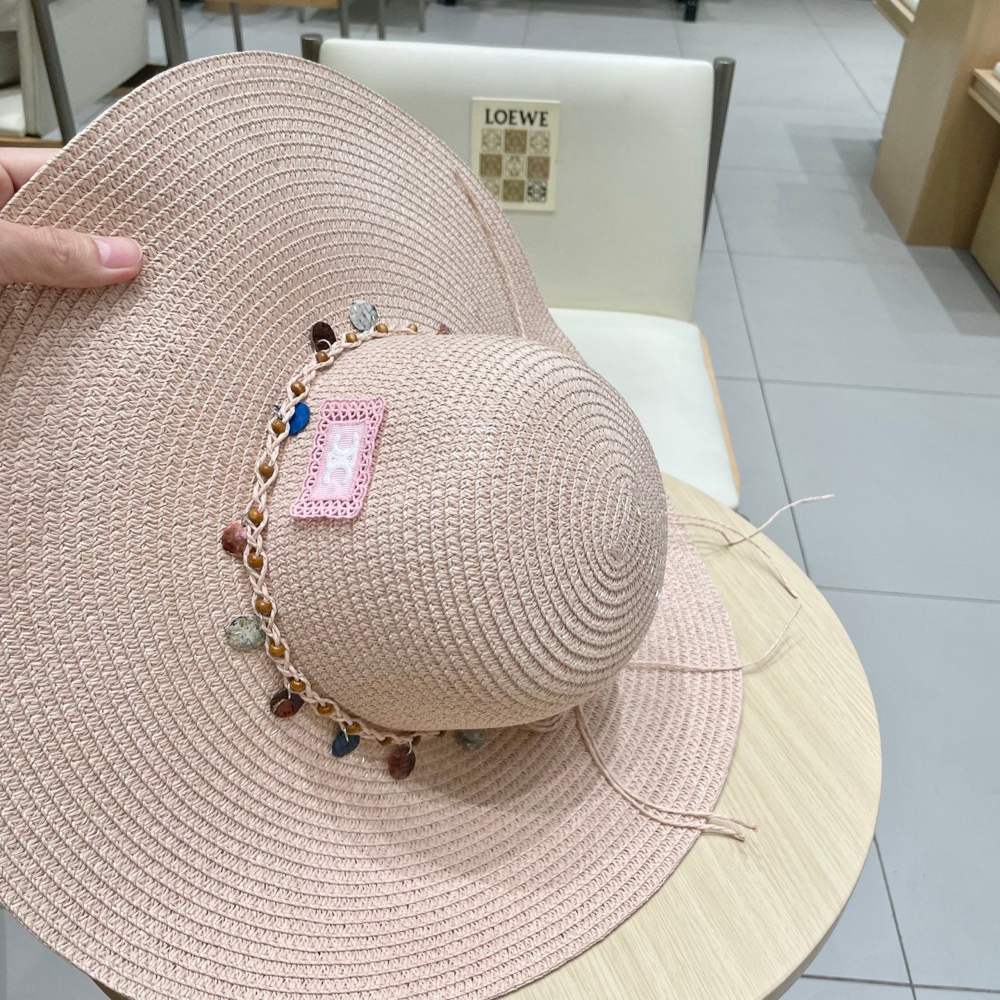 CELINE WIDE BRIM HAT MODEL 652184 IN LIGHT PINK WOVEN STRAW