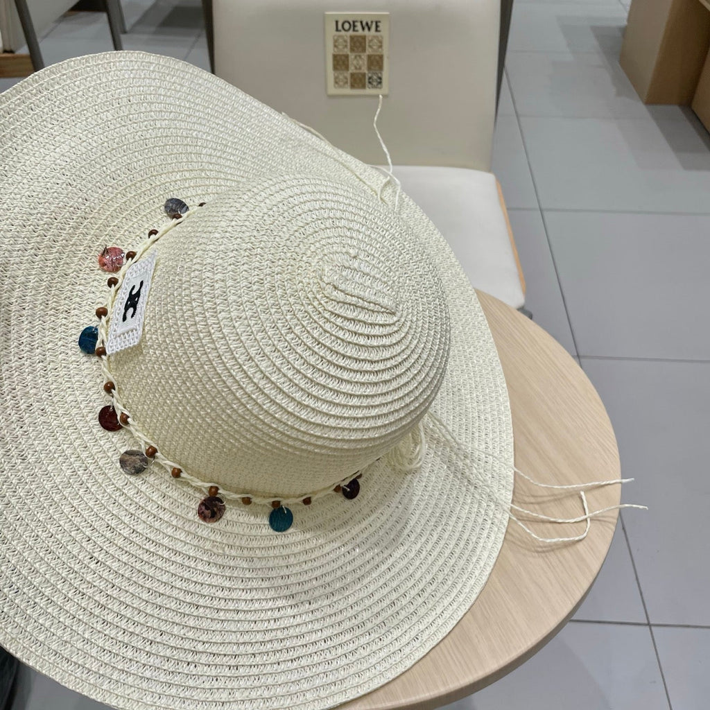 CELINE WIDE BRIM HAT MODEL 652186 IN WHITE WOVEN STRAW
