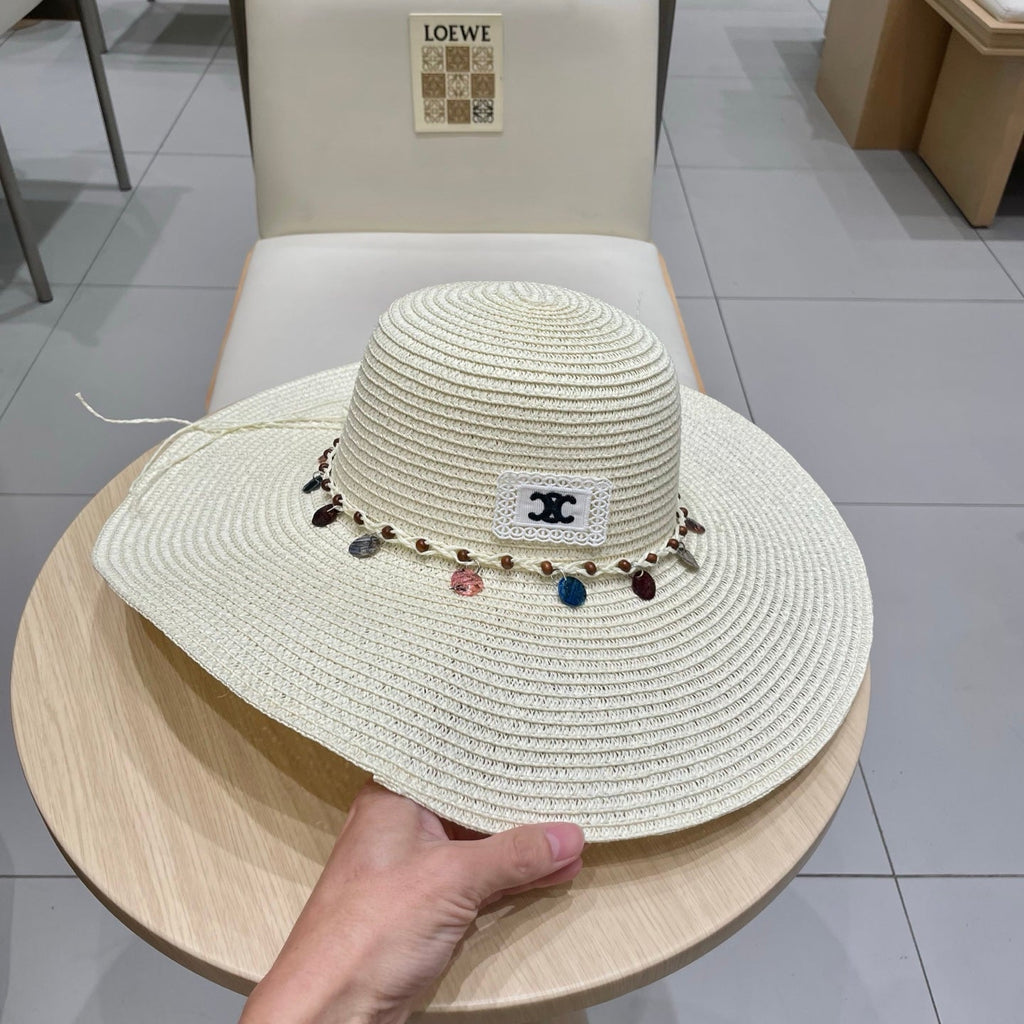 CELINE WIDE BRIM HAT MODEL 652186 IN WHITE WOVEN STRAW