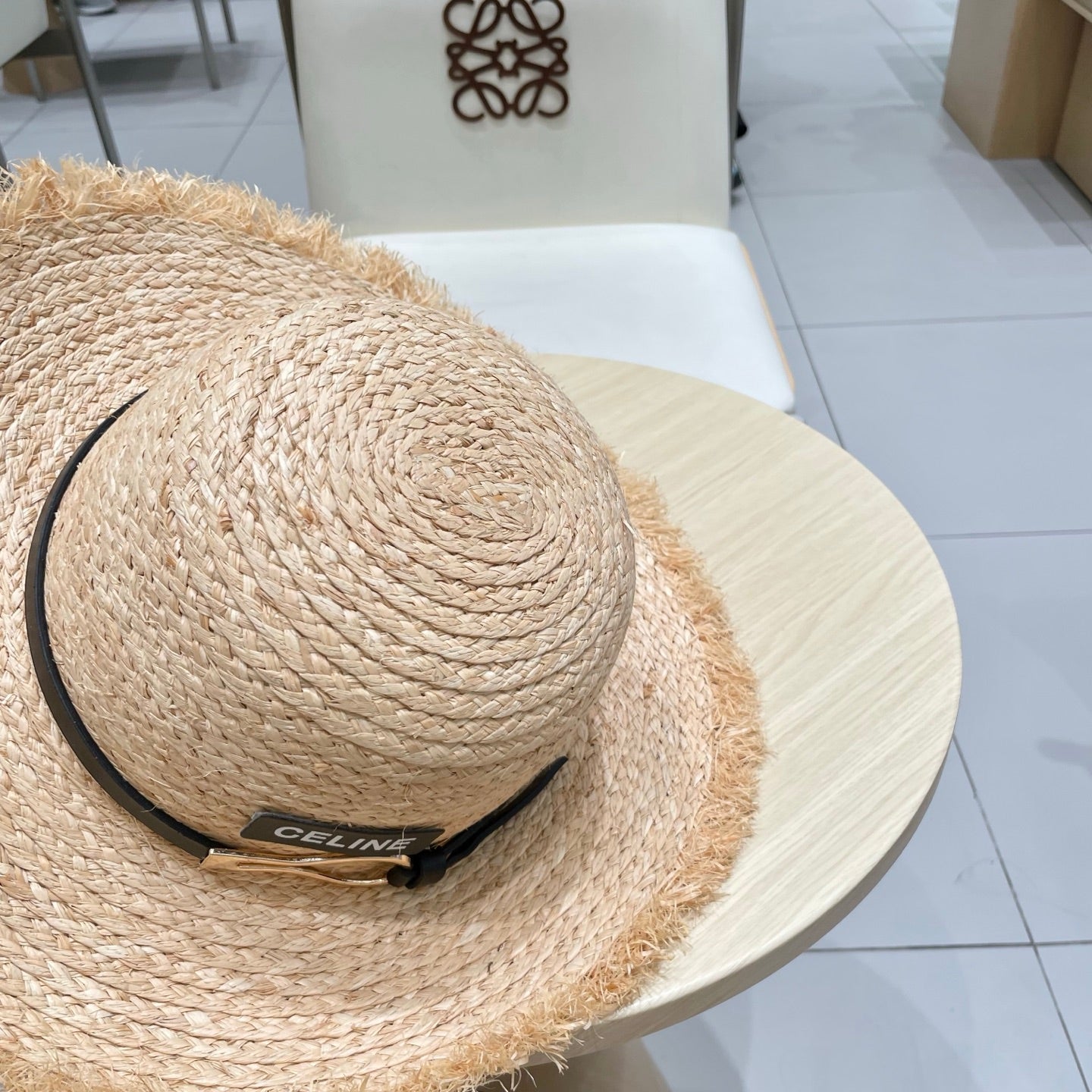 CELINE WIDE BRIM HAT MODEL 650422 IN NATURAL WITH BLACK LEATHER STRAP RAFFIA STRAW