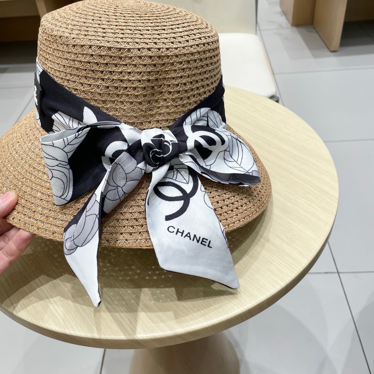 CHANEL NATURAL STRAW BUCKET HAT WITH RIBBON 672773